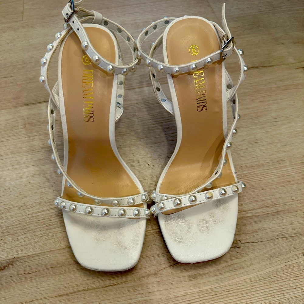 White heels with pearls